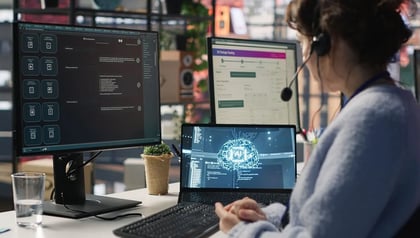 Top 10 agentic AI development companies concept shown by a woman at computers with an AI brain graphic.