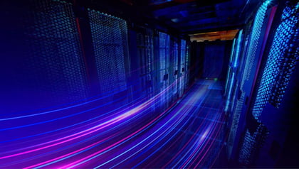 Server room corridor with glowing blue and pink light streaks illustrating high-speed data flow, representing a data pipeline