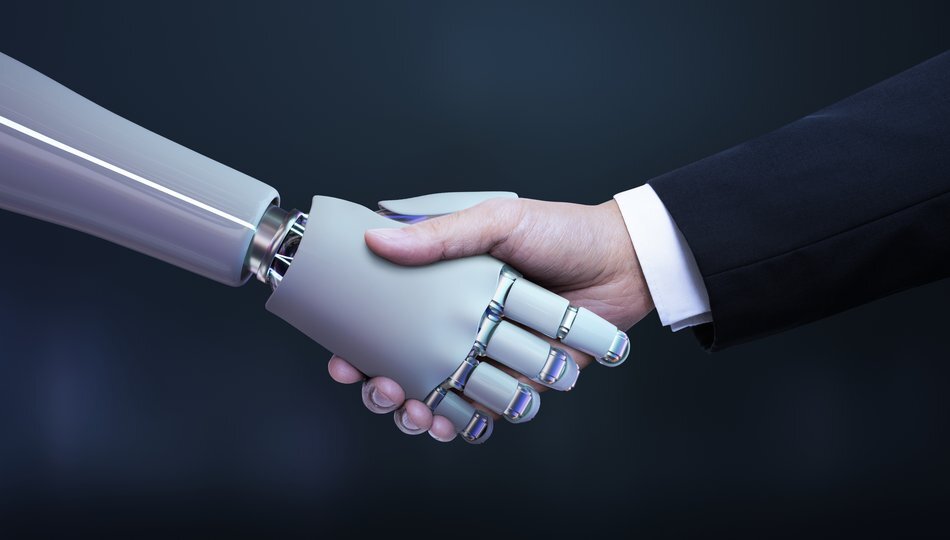 Robotic hand shaking a businessman's hand, symbolizing partnership between human expertise and AI strategy consulting.