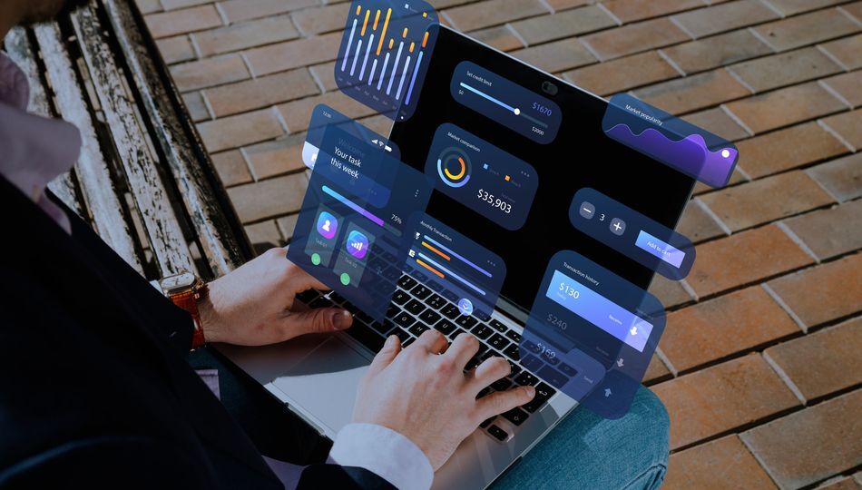 Fintech Software Development dashboard displayed on a laptop with financial analytics and interactive data visualizations.